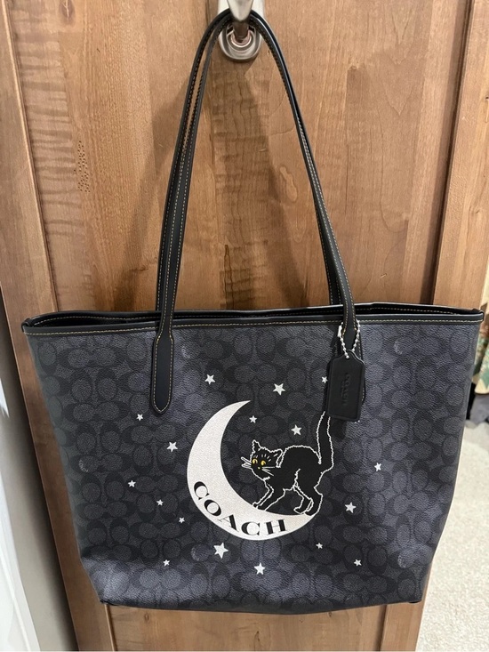 Coach Handbags - Coach Black Signature Canvas Tote with Moon & Cat Graphic